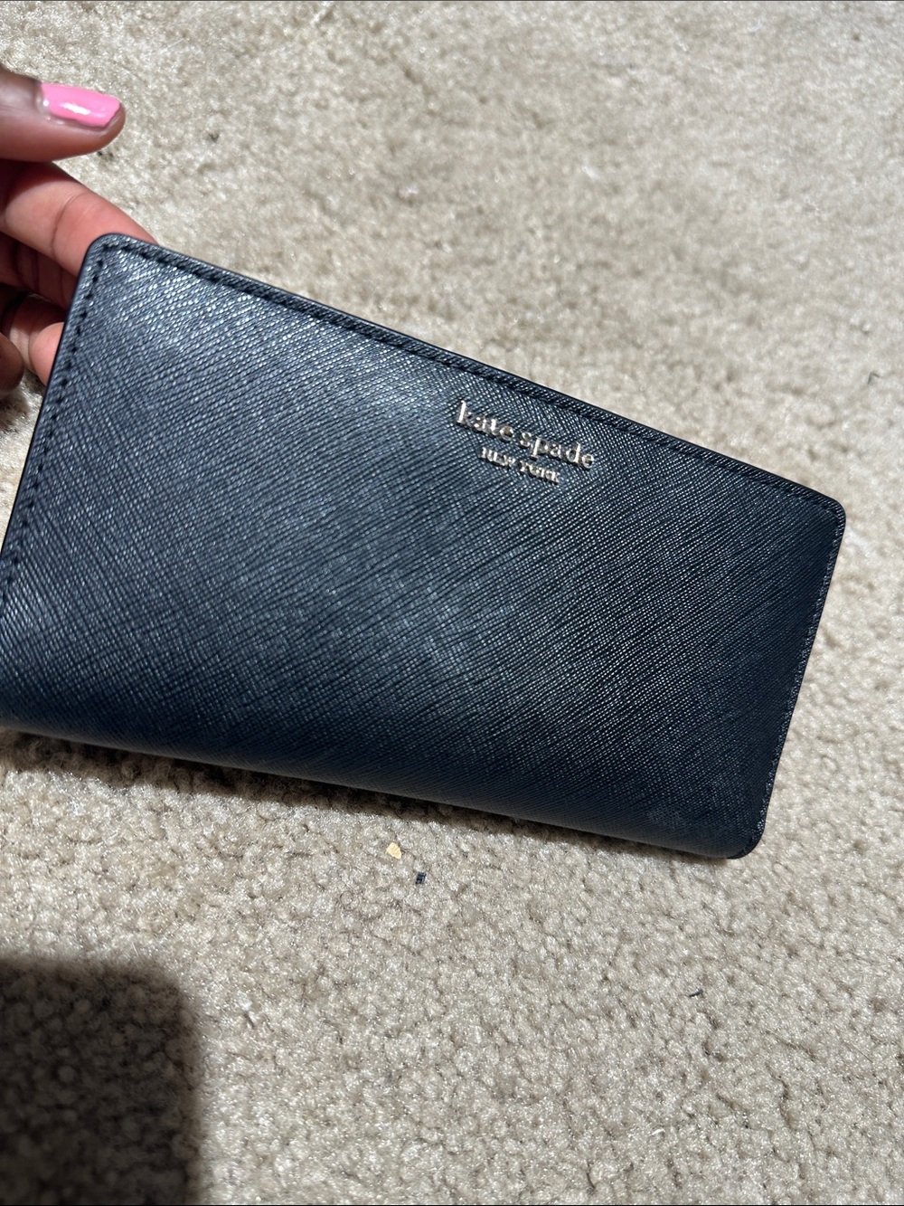kate spade black saffiano zip-around continental wallet